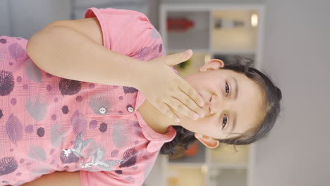 Vertical-video-of-The-sneezing-girl-child.-Patient.